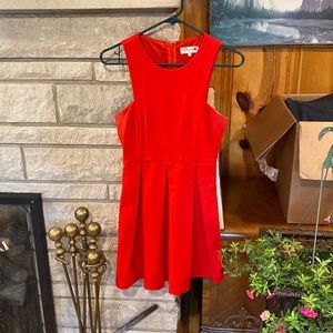 De Phil small red cocktail dress.